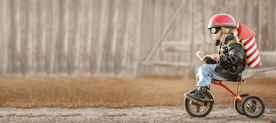 Boy play in the rider and the rocketman